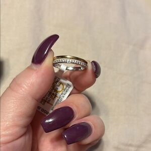 Elegant Gold and Silver Ring with Purple Accents